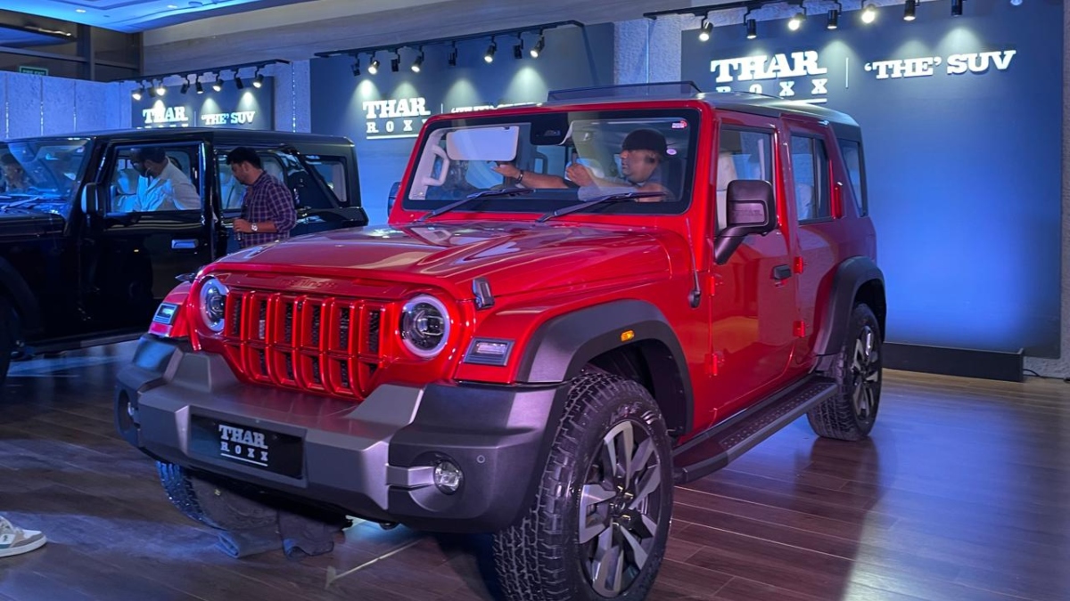 Mahindra Thar Roxx, Thar Roxx 4x4, Mahindra Thar Roxx prices, Thar Roxx variants, Thar Roxx features, 4x4 diesel engine, Thar Roxx MX5, Thar Roxx AX5L, Thar Roxx AX7L, Mahindra SUV, off-road vehicle, 2.2-litre diesel engine, Thar Roxx bookings, Maruti Suzuki Jimny competitor, Force Gurkha rival, Thar Roxx specifications, Mahindra Thar 2024